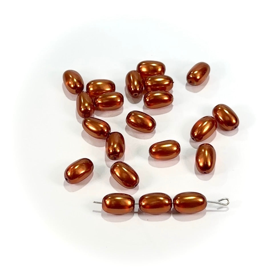 Czech Olive Shaped Glass Pearls Orange Luster Pearlized in sizes 12x8mm or 15x9mm