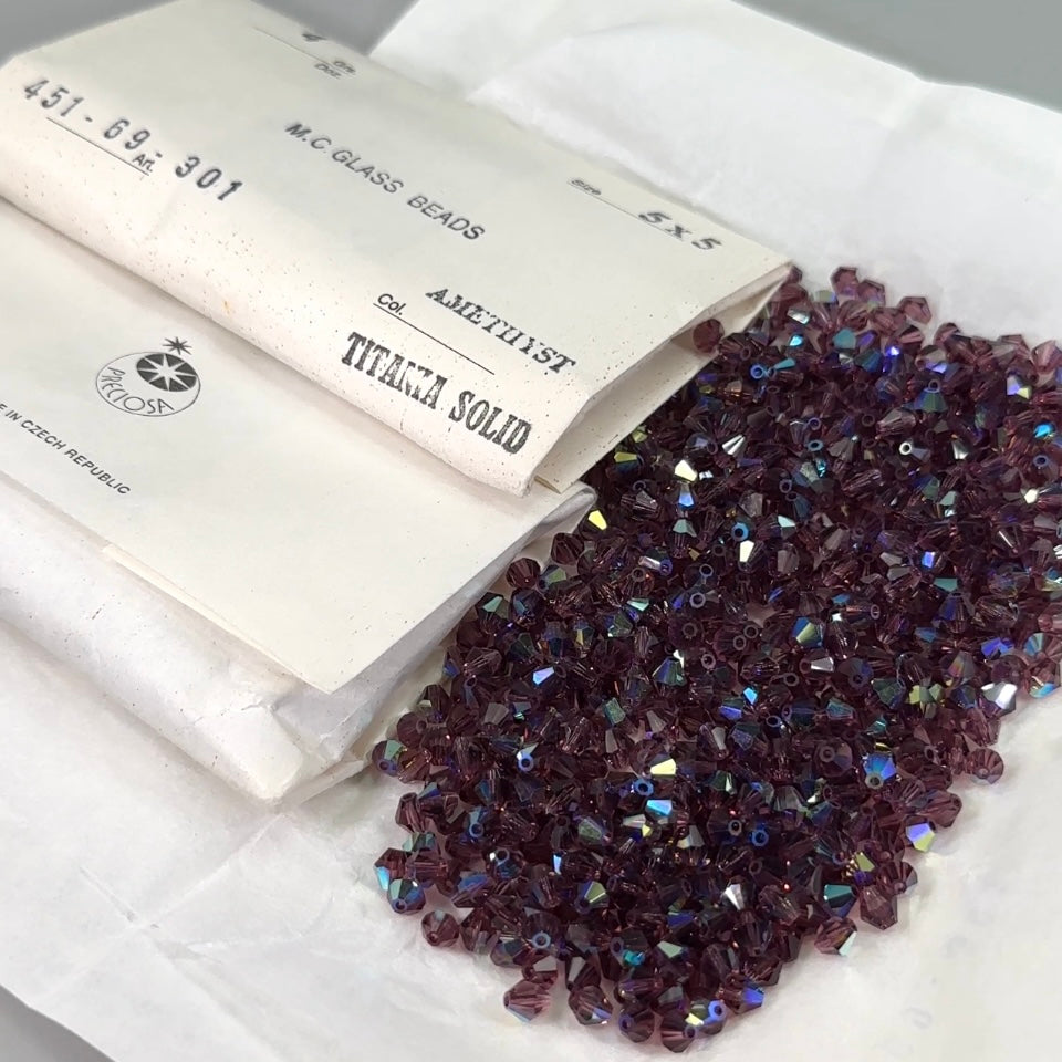 Amethyst AB, Czech Glass Beads, Machine Cut Bicones (MC Rondell, Diamond Shape), purple crystals coated with Aurora Borealis