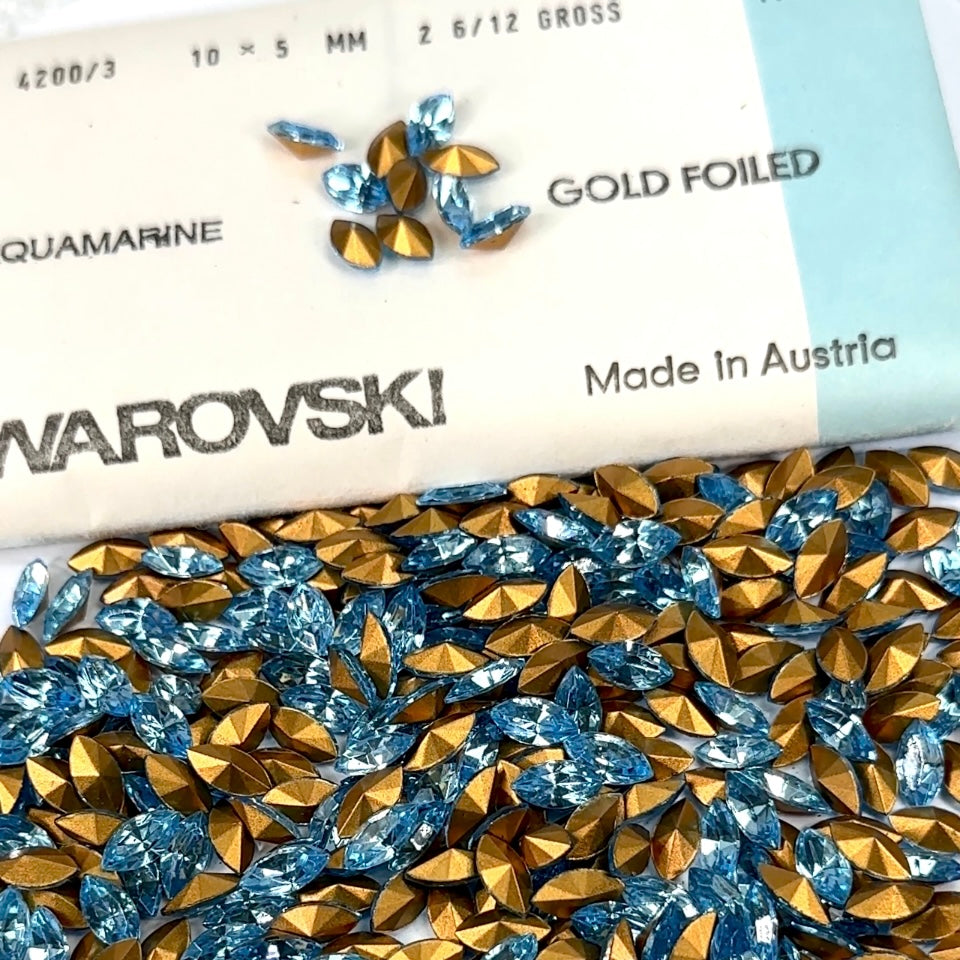 Swarovski Art.# 4200/3 - Aquamarine blue Gold Foiled Pressed Navette Pointed Back Stones in size 10x5mm 360pcs SW080