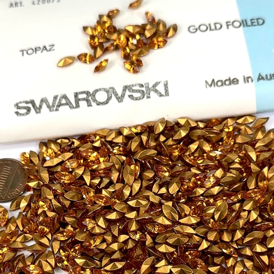 Swarovski Art.# 4200/3 - Topaz Gold Foiled Pressed Navette Pointed Back Stones in size 8x4mm 720pcs SW081