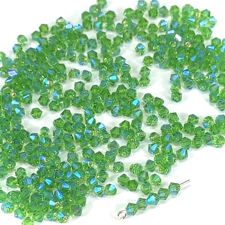 Peridot AB2X fully coated Czech Glass Beads Machine Cut Bicones (MC Rondell Diamond Shape) light green crystals double coated with Aurora Borealis 3mm 4mm