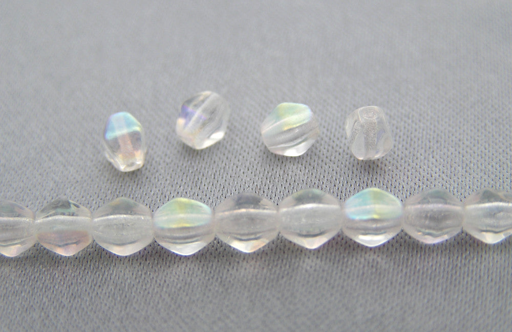 51 Czech Glass Druk Beads 4mm Crystal AB pressed smooth bicone, clear AB, P204