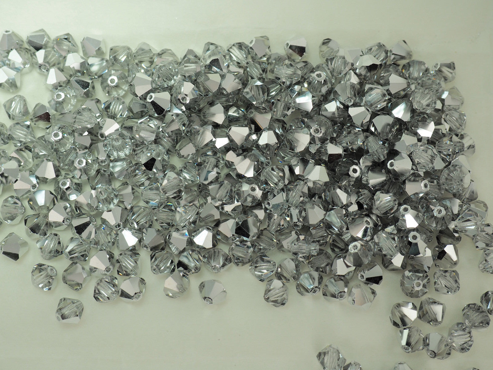Crystal Labrador Half, Czech Glass Beads, Machine Cut Bicones (MC Rondell, Diamond Shape), clear crystals half coated with CAL silver metallic