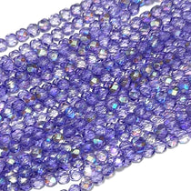 A strand of faceted round crystal beads with a purple lavender and aurora boreale coating.