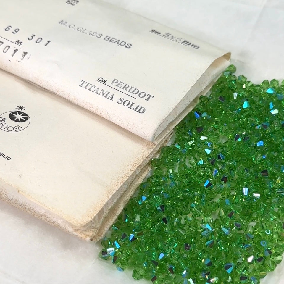 Peridot AB Czech Glass Beads Machine Cut Bicones (MC Rondell Diamond Shape) light green crystals coated with Aurora Borealis 3mm 4mm 5mm 6mm 8mm