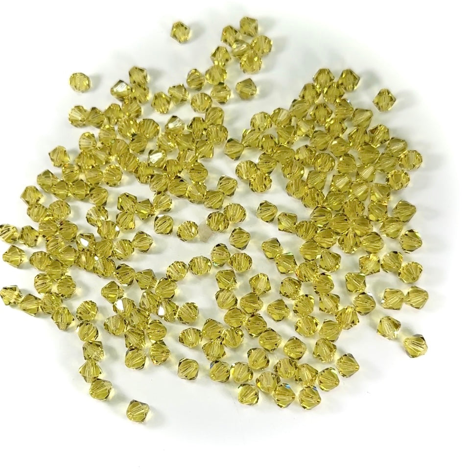 Acid Yellow (Preciosa color) Czech Glass Beads Machine Cut Bicones (MC Rondell Diamond Shape) pale lime yellow green crystals 3mm 4mm 6mm