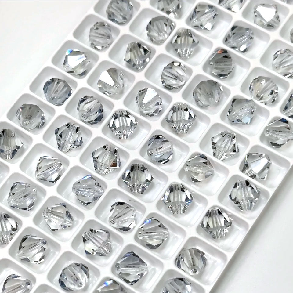 Crystal Lagoon coated (Preciosa color), Czech Glass Beads, Machine Cut Bicones (MC Rondell, Diamond Shape), clear light blue coated crystals, 8mm