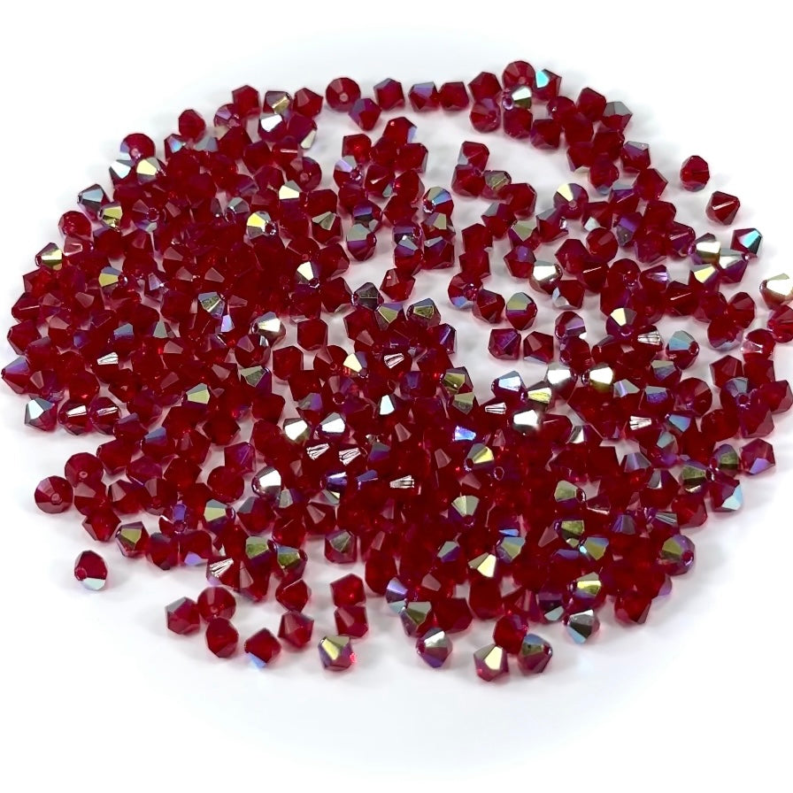 Medium Siam AB, Czech Glass Beads, Machine Cut Bicones (MC Rondell, Diamond Shape), red crystals coated with Aurora Borealis