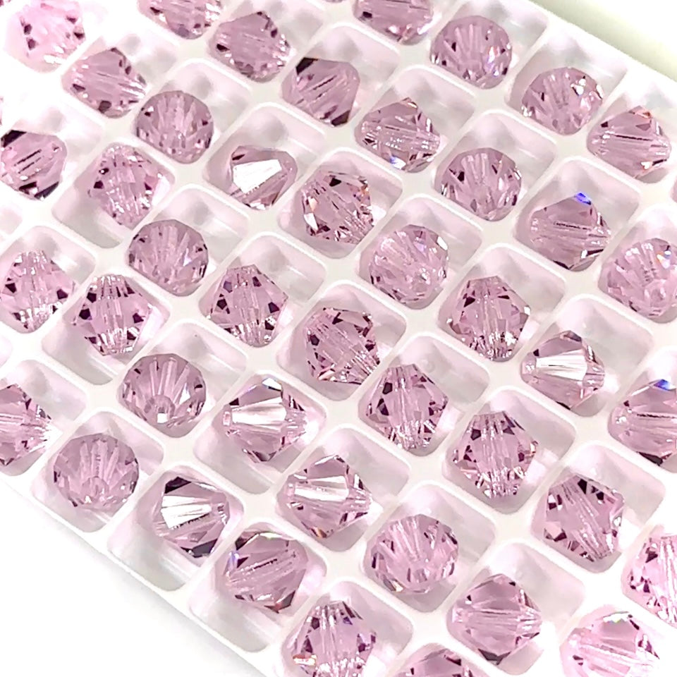 Pink Sapphire (Preciosa color), Czech Glass Beads, Machine Cut Bicones (MC Rondell, Diamond Shape), light pink crystals