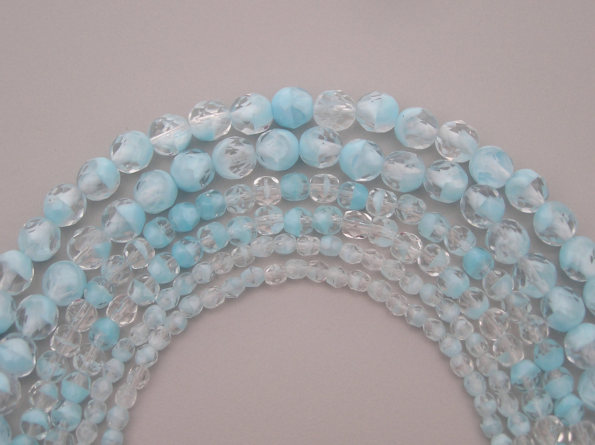 Crystal Light Blue Givre, 2-tone combination, Czech Fire Polished Round Faceted Glass Beads, 7 inch strands