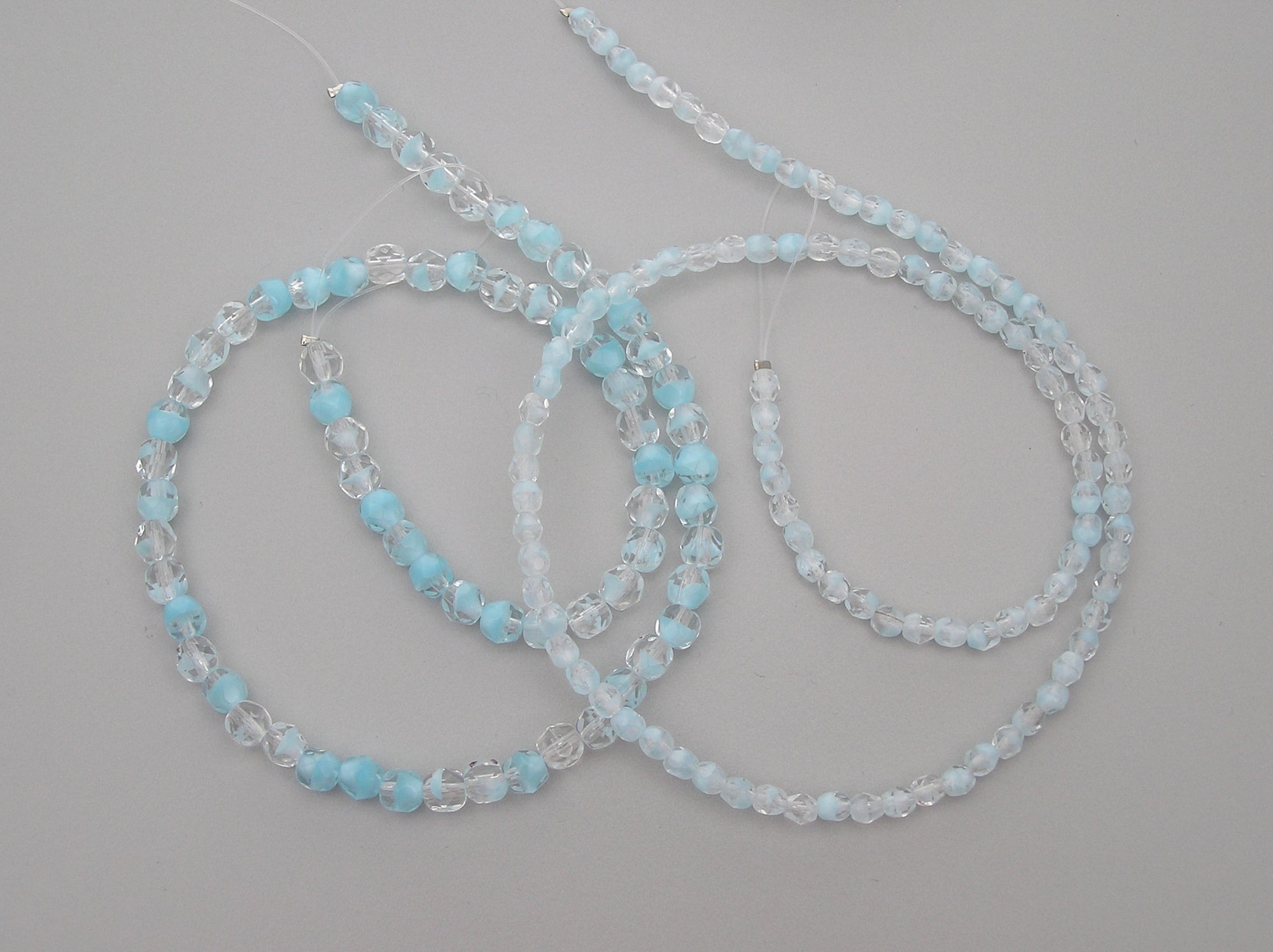 Crystal Light Blue Givre, 2-tone combination, Czech Fire Polished Round Faceted Glass Beads, 7 inch strands