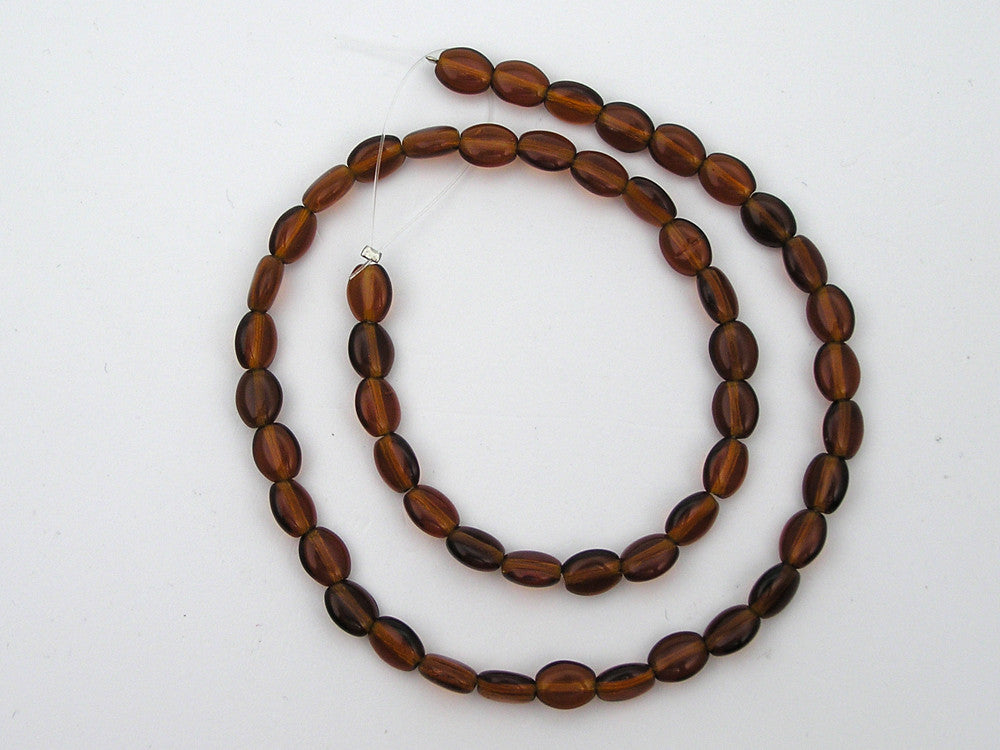 51 Czech flat oval druk beads 8x6mm Smoked Topaz, dark brown color, 16 inch strand