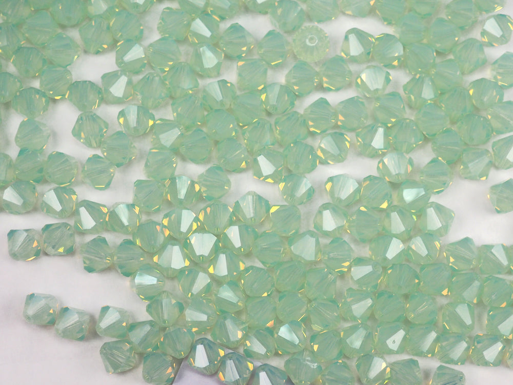 Chrysolite Opal (Preciosa color), Czech Glass Beads, Machine Cut Bicones (MC Rondell, Diamond Shape), pale milky green crystals