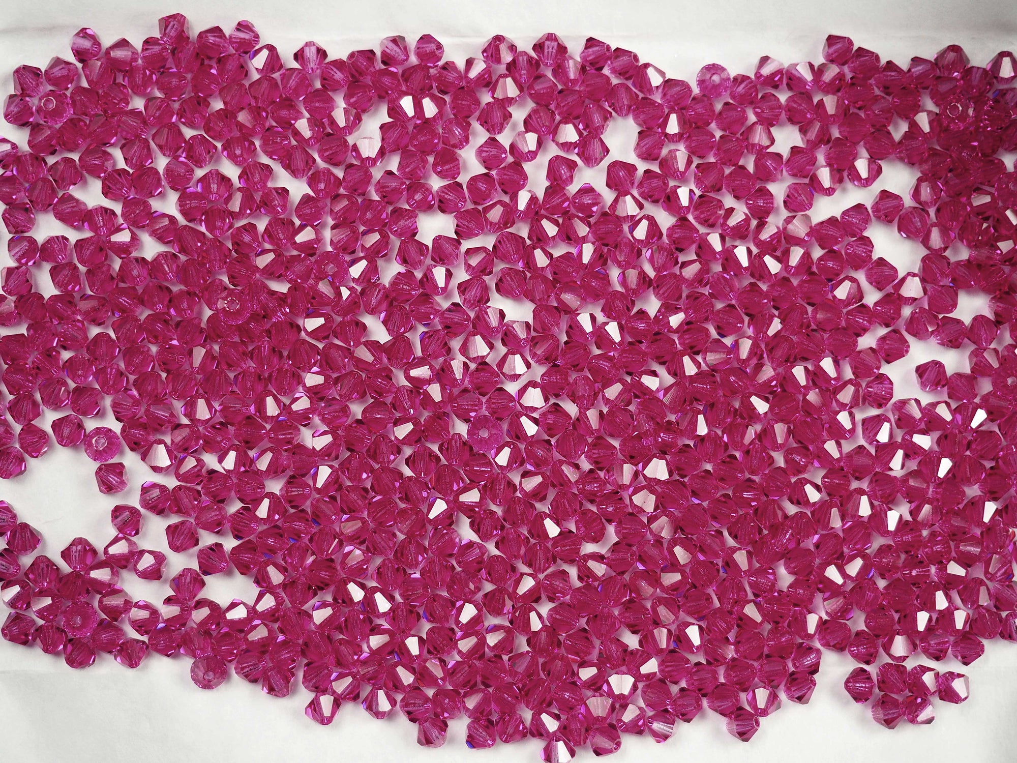 Fuchsia (Preciosa color), Czech Glass Beads, Machine Cut Bicones (MC Rondell, Diamond Shape), hot pink crystals