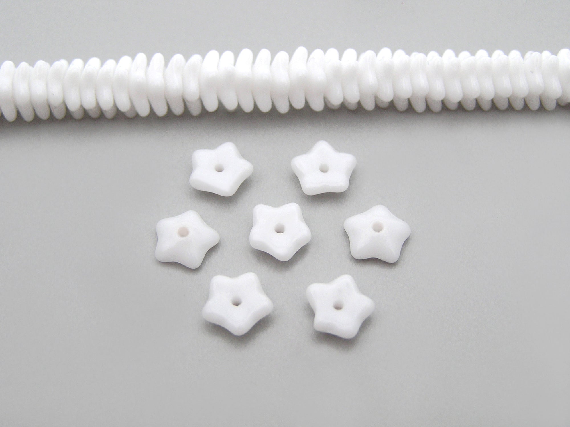 192 Czech glass flat star bead cups 7x3mm Chalk White color, 16 inch strand