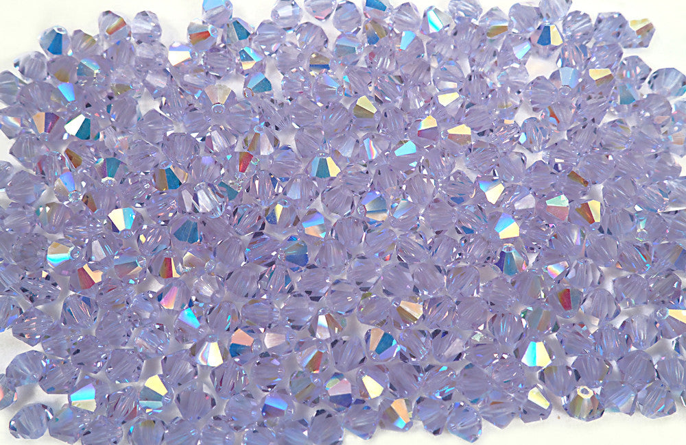 Alexandrite AB, Czech Glass Beads, Machine Cut Bicones (MC Rondell, Diamond Shape), pale blue to violet changing color crystals coated with Aurora Borealis