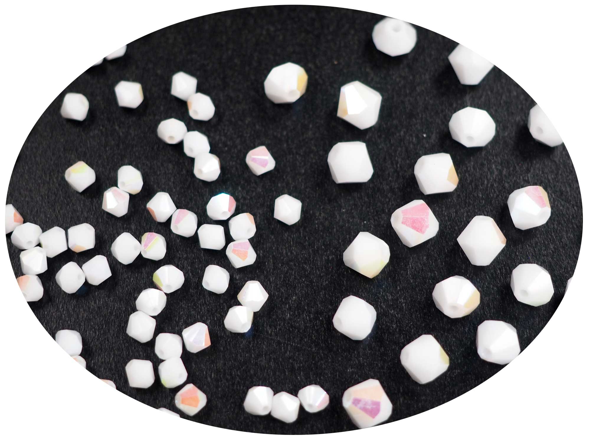 Chalk White AB, Czech Glass Beads, Machine Cut Bicones (MC Rondell, Diamond Shape), opaque chalkwhite crystals coated with Aurora Borealis