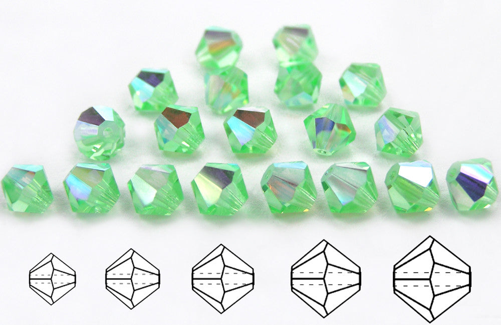 Chrysolite AB, Czech Glass Beads, Machine Cut Bicones (MC Rondell, Diamond Shape), pale green crystals coated with Aurora Borealis
