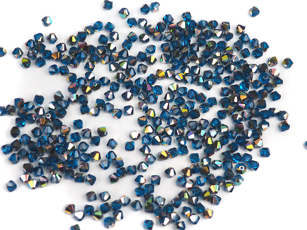 Dark Aqua Vitrail coated, Czech Glass Beads, Machine Cut Bicones (MC Rondell, Diamond Shape), deep blue crystals coated with Vitrail Medium