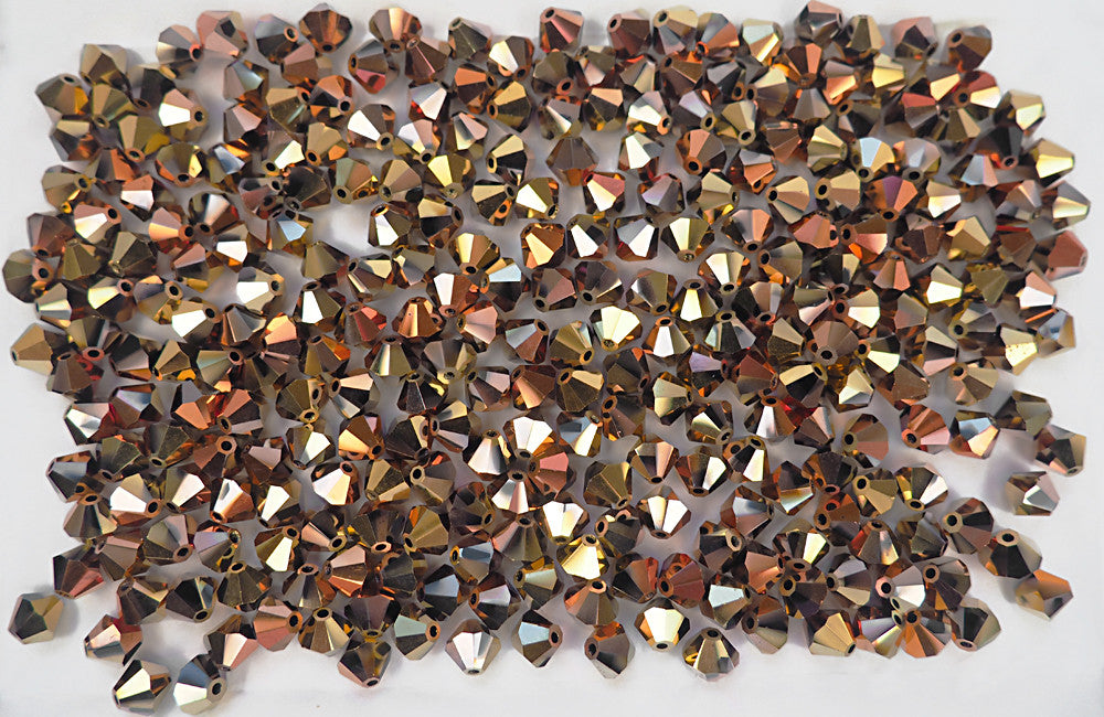 Jet California Golden Rush (Black Aurum Bronze), Czech Glass Beads, Machine Cut Bicones (MC Rondell, Diamond Shape), jet black crystals coated with multi gold metallic