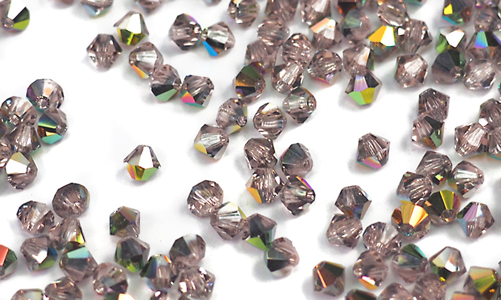 Rosaline Vitrail coated (Vintage Rose Vitrail) Czech Glass Beads Machine Cut Bicones (MC Rondell, Diamond Shape) light pink crystals coated with Vitrail Medium 3mm 4mm 6mm